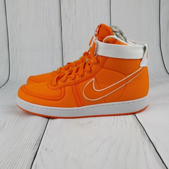 orange and blue nike high tops